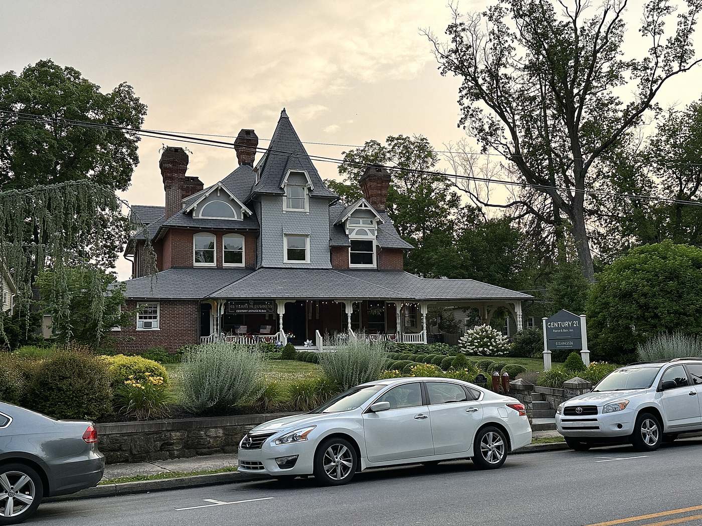The Chalfant House on a Kennett Square street in June. Porches, turrets and a hundred-odd years of other people's repairs.